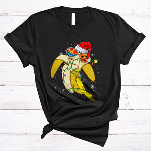 MacnyStore - Banana Wearing Sunglasses Santa, Adorable Christmas Lights Fruit, X-mas Vegan Lover T-Shirt